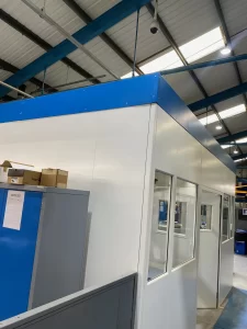 Double skin steel partitioning office with a blue fascia in Congleton