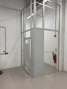 Mesh security cage with double lift panels in a Newcastle facility